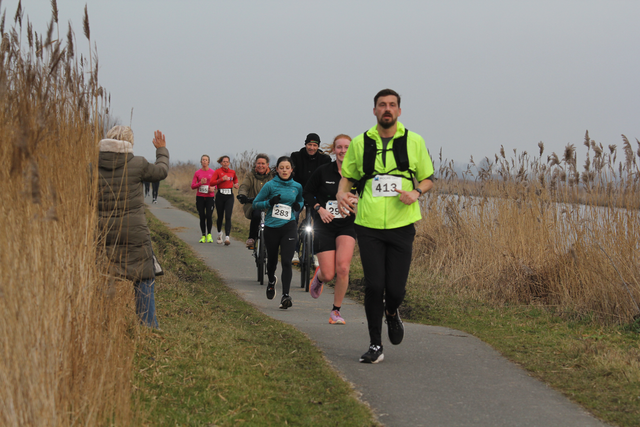 Running through the polder during the Middendelfland Half Marathon